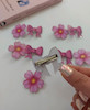 گیره انبری ایموجی 🌸🎀