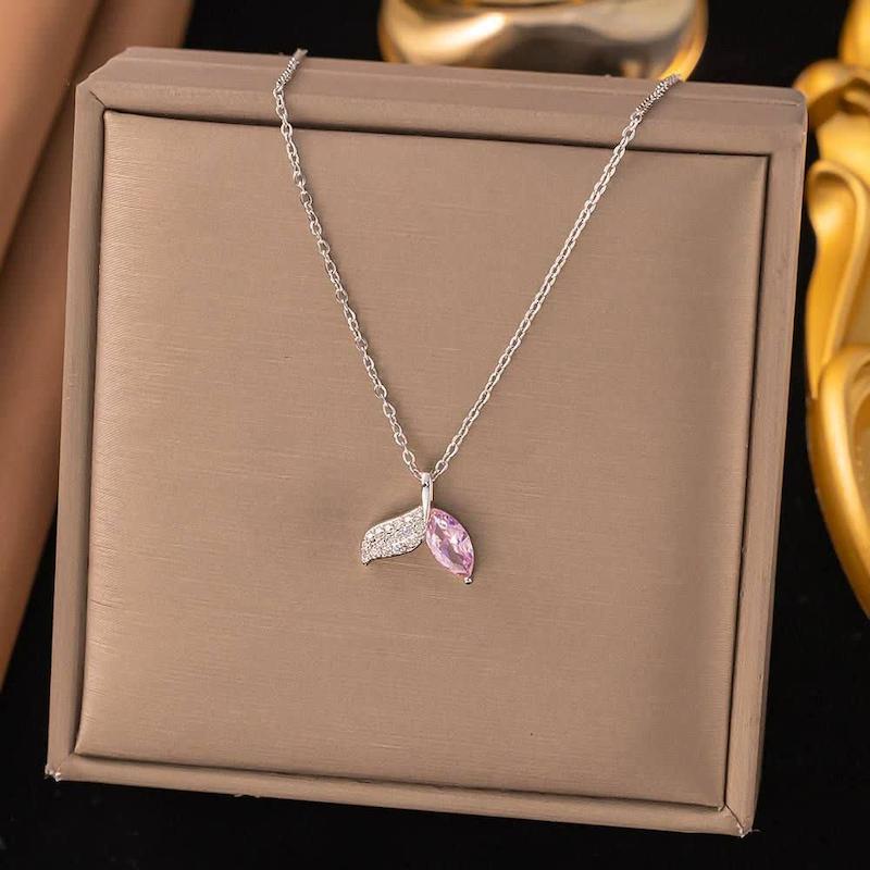 https://mrkharazi.com/product/Swarovski Whale Tail Necklace