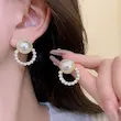 گوشواره زنانه وارداتی طرح pearl round رنگ طلایی برند shein