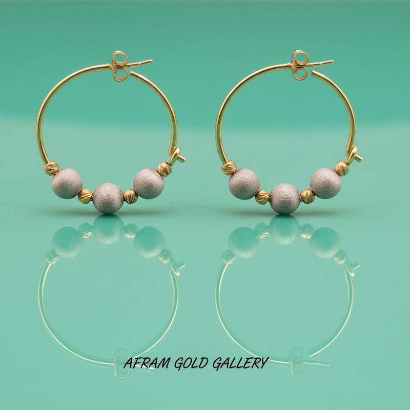 گوشواره طلا ،گوشواره قفلی،گوشواره سبك و مدرن،گوشواره كادويي گوشواره طلای حلقه ای با گوی،گوشواره سبك و مدرن،گوشواره كادويي  مناسب استایل های خاص  نمادار و جلوه عالی  وزن 3.730 گرم