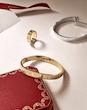 دستبند زنانه وارداتی طرح کارتیر cartier لاو love رنگ طلایی آنلیمیتد unlimited با کد حک شده