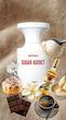 عطر Sugar Addict BORNTOSTANDOUT زنانه و مردانه با رایحه وانیل، شکر، رام و کاکائو