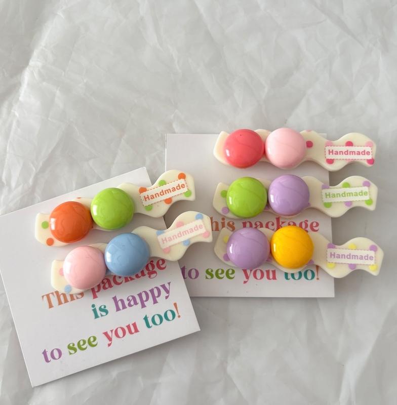 گیره ژورنالی دکمه ای 