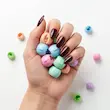 مهره مو رنگی بسته 10 عددی AKASH065