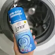 لنور خوشبو کننده لباس و ماشین لباسشویی lenor مدل بهاری spring awaking حجم ۱۵۵گرم واردات قانونی ارسال از منطقه آزاد ارس