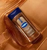 روغن بدن ژلی شاین کره کاکائو وازلین آبرسان قوی Vaseline Glazed and Glisten Golden Hour Body Gel Oil