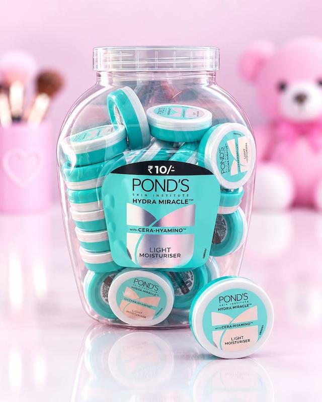 کرم مرطوب‌کننده مینی پوندز POND'S Hydra Miracle با بسته‌بندی گرد سبز و سفید