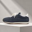 کتونی زنانه آلوا جیر سرمه‌ای با بند سفید و زیره قهوه‌ای | Alva Women’s Navy Suede Sneaker