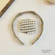 تل تاشو مرواریدی