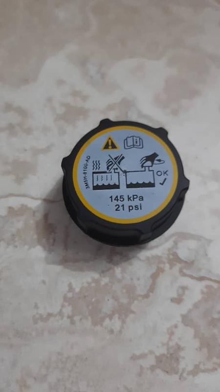 درب مخزن رادیاتور  مزدا ۳ قدیم و جدید