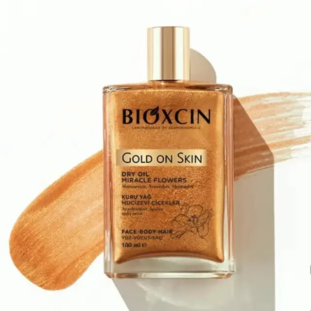 روغن مرطوب کننده و شاین صورت و بدن و مو بیوکسین Bioxin مدل Gold On Skin حجم 100 میل