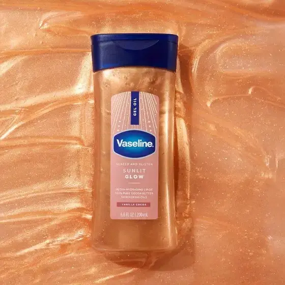 روغن بدن شاین‌دار وازلین اورجینال مدل Sunlit Glow ژل اویل براق‌کننده 200 میلی‌لیتر