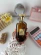 عطر ادکلن موصوف قهوه ای ارض الزعفران MOUSUF