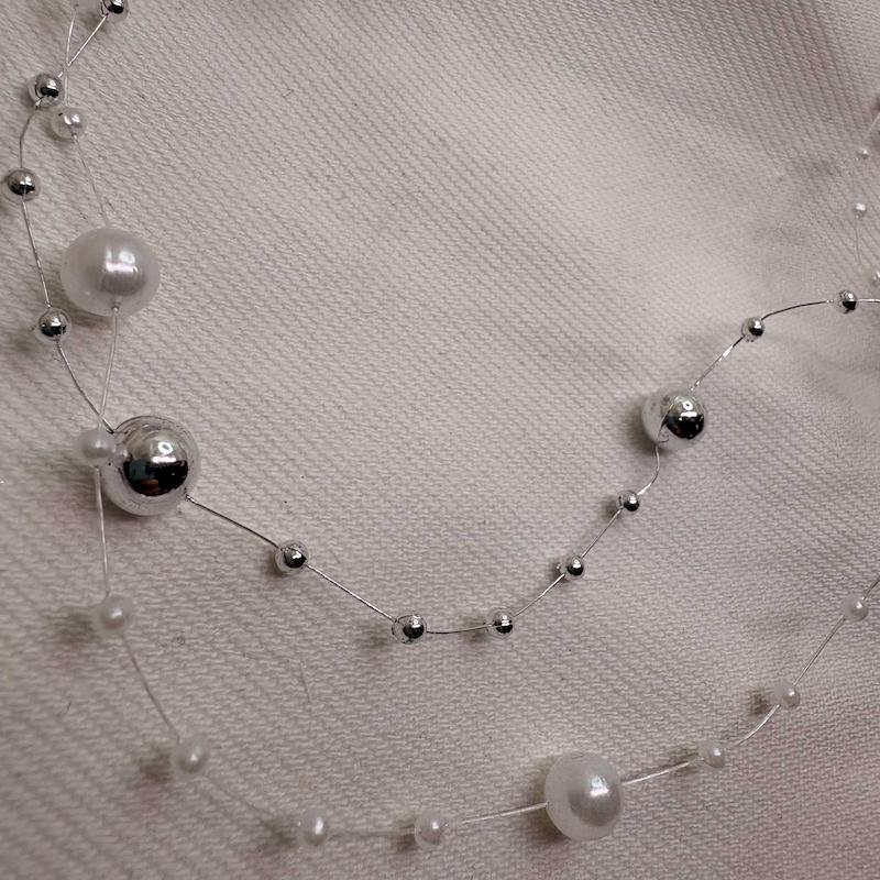 گردنبند نامرئی طرح «مروارید معلق» (Illusion Necklace) | مینیمال و اقتصادی