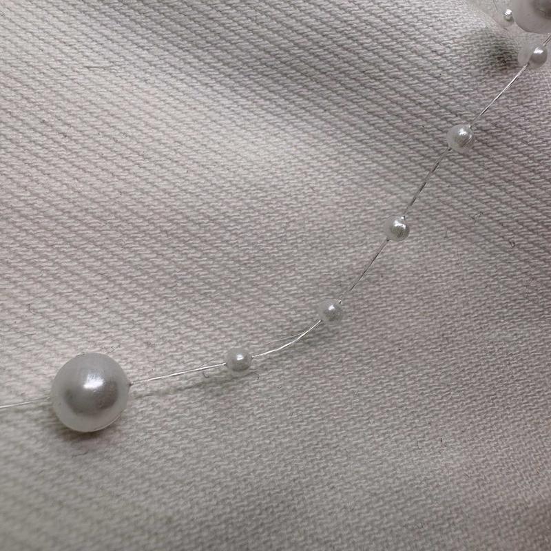 گردنبند نامرئی طرح «مروارید معلق» (Illusion Necklace) | مینیمال و اقتصادی