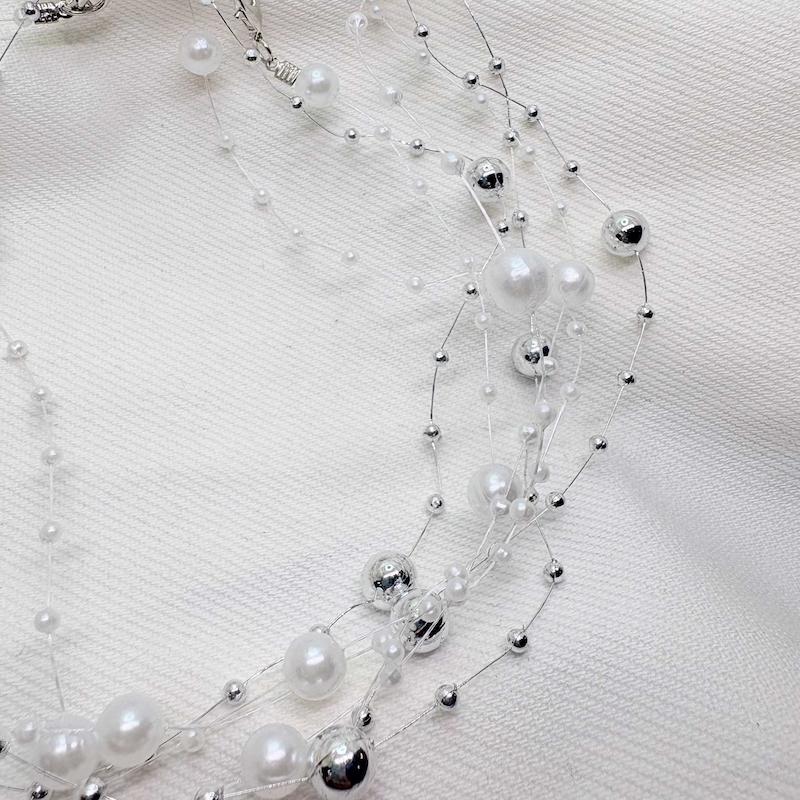 گردنبند نامرئی طرح «مروارید معلق» (Illusion Necklace) | مینیمال و اقتصادی