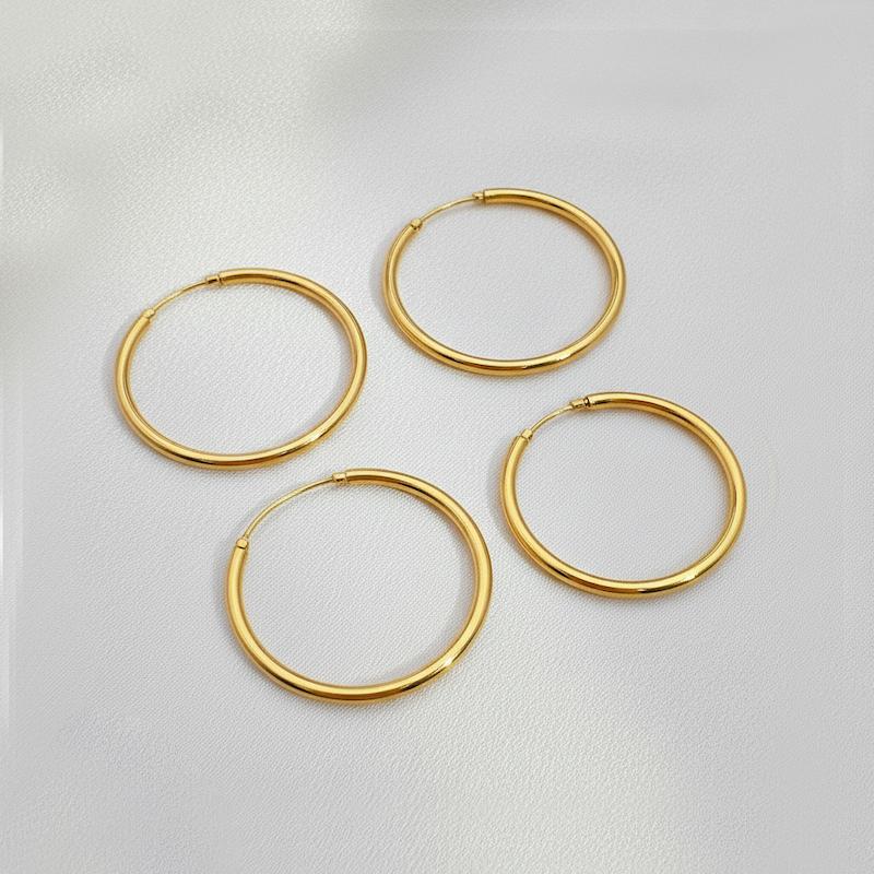 گوشواره حلقه‌ای ساده دریم طلایی براق