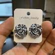 گوشواره دفرمه گل طلایی و نقره ای 