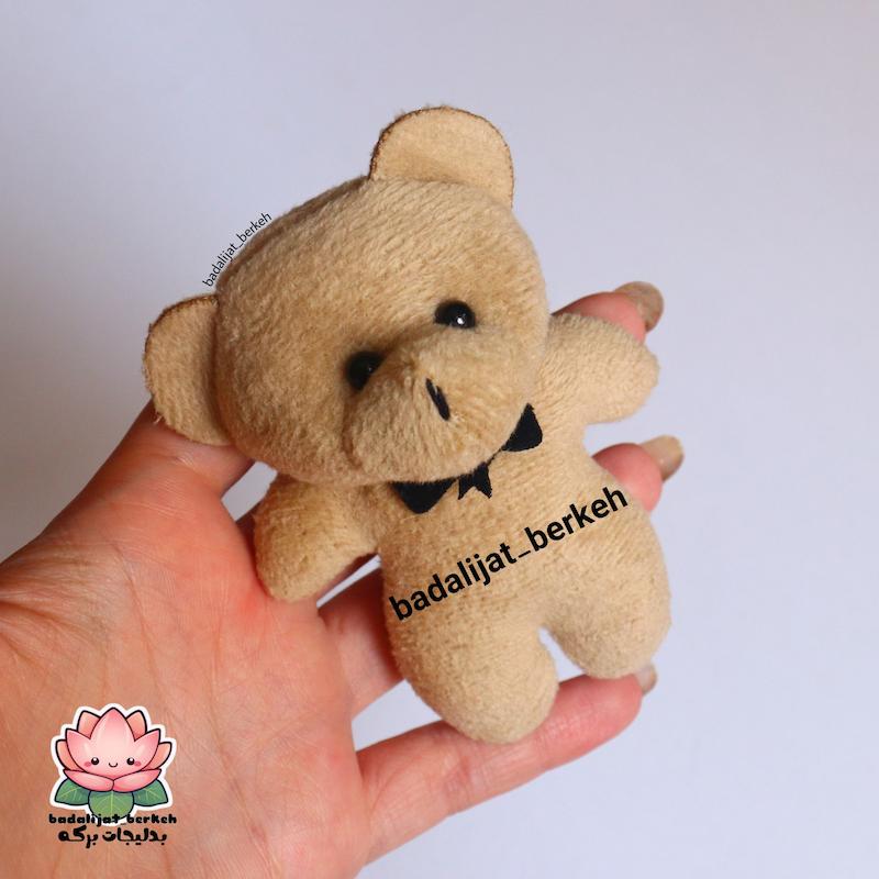 عروسک خرس . خرس ولنتاین. خرس بوکت و دسته گل