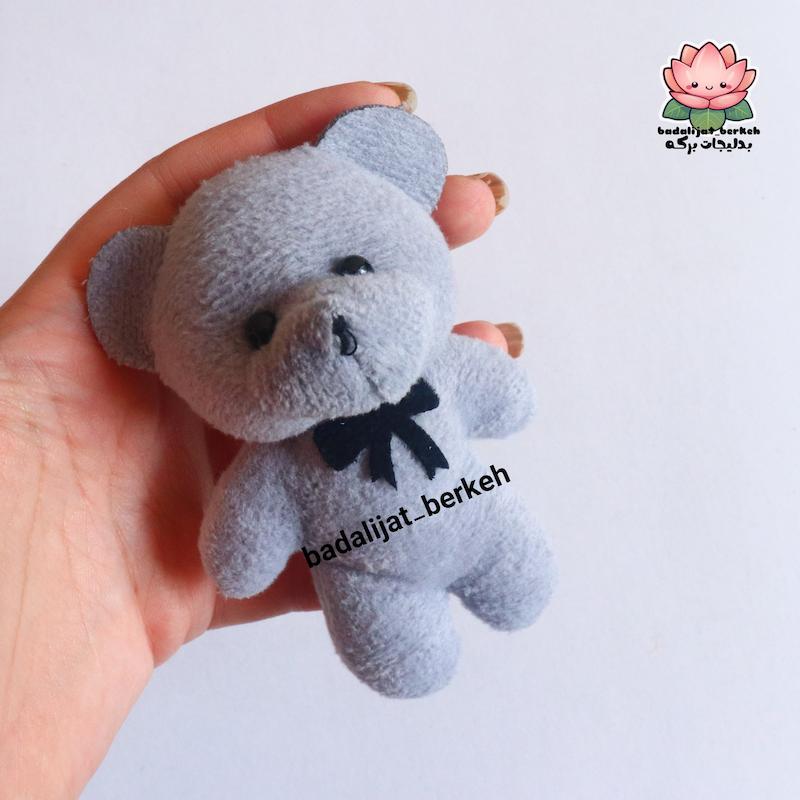 عروسک خرس . خرس ولنتاین. خرس بوکت و دسته گل
