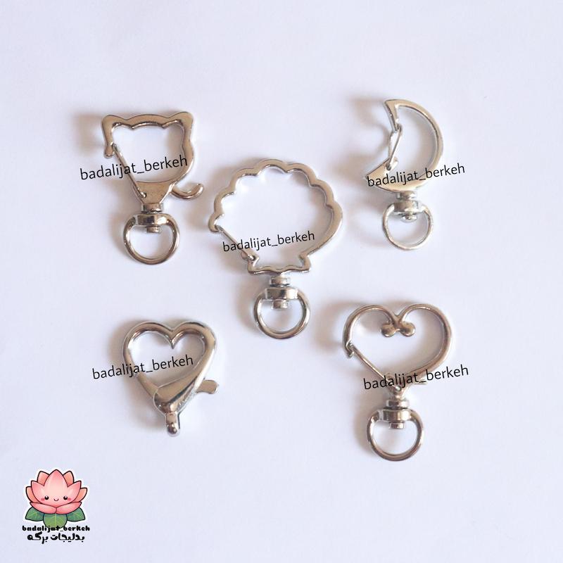 قفل فلزی نقره ای طرح گربه و قلب و ماه و صدف . قفل چارم بگ و اکسسوری