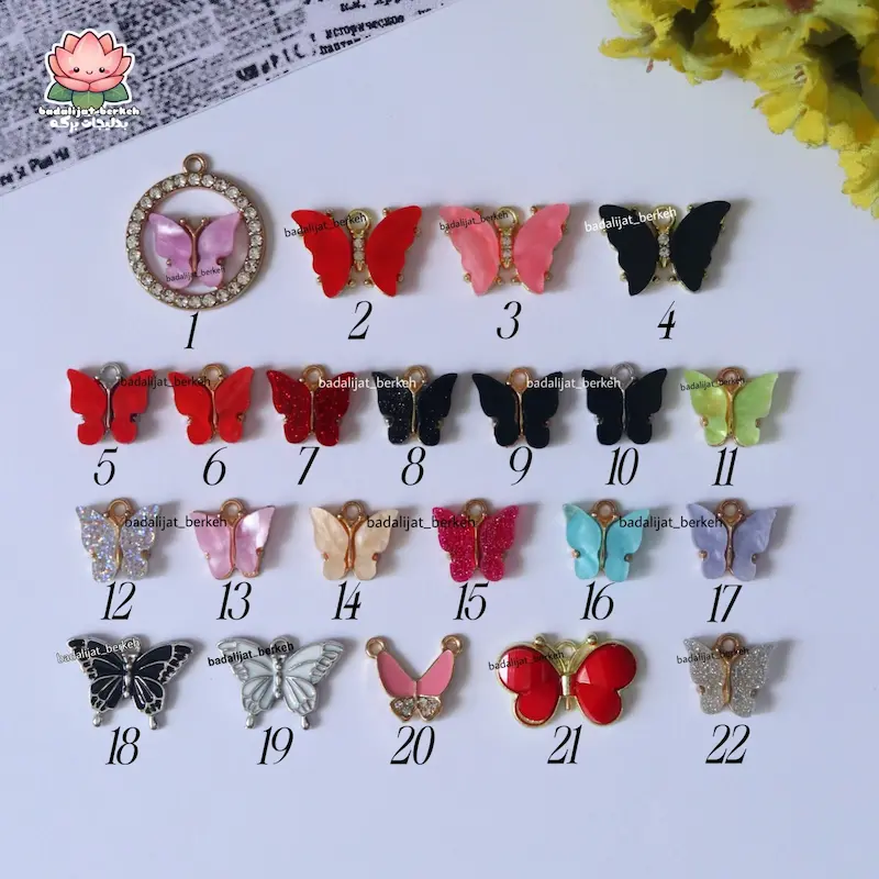 پلاک طرح پروانه با حلقه استیل