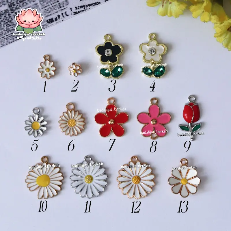 پلاک فانتزی طرح گل و گل بابونه با حلقه استیل