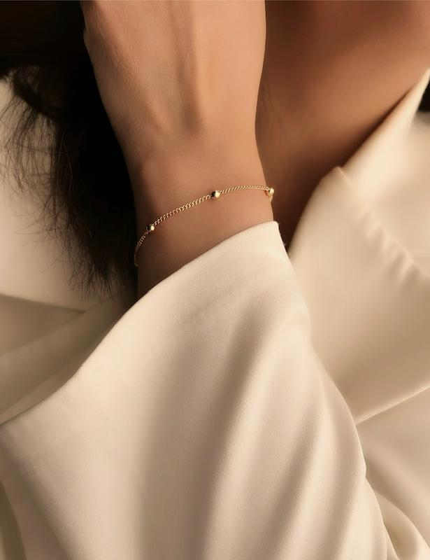 دستبند توپی گلد 