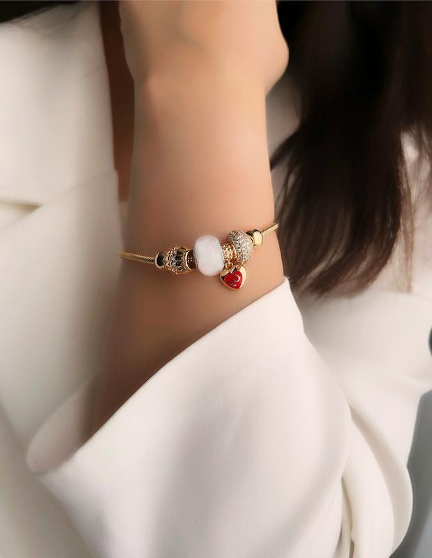 دستبند پاندورا مهره سفید گلد