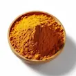 پودر زردچوبه در کاسه با پس زمینه سفید