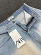 شلوار جین آبی روشن زاپ‌دار طرح ZARA مدل Premium Distressed | استریت‌استایل مدرن زنانه و مردانه ZARA Premium Distressed Light Blue Jeans | Modern Unisex Street Style