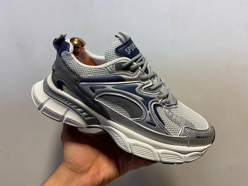 کتونی اسپرت مردانه زنانه رانینگ مدل چانک‌ویو طوسی سرمه‌ای با رویه مش، فریم تقویتی و زیره آنتی‌شوک مناسب دویدن و استایل کژوال – کتانی رانینگ بازارل