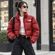 کاپشن پافر قرمز براق کراپ زنانه طرح NORTH FACE بازارل – Brick Red Glossy cropp Puffer Jacket | BAZARELL