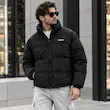 کاپشن پافر شمعی مردانه مشکی با یقه ایستاده و فرم حجیم شهری، برند بازارل
