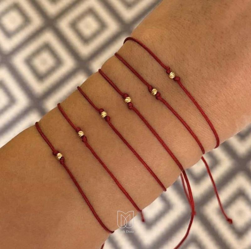 دستبند زنانه طلا ۱۸ عیار دستبند نخی با کوی البرنادو هیلا گالری