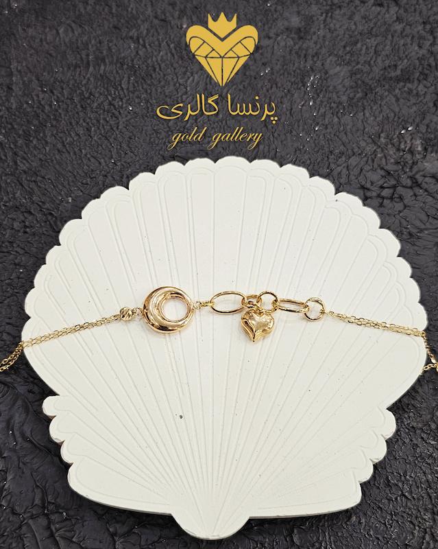 دستبند زنانه طلا ۱۸ عیار قلب و هرمس پرنسا گالری