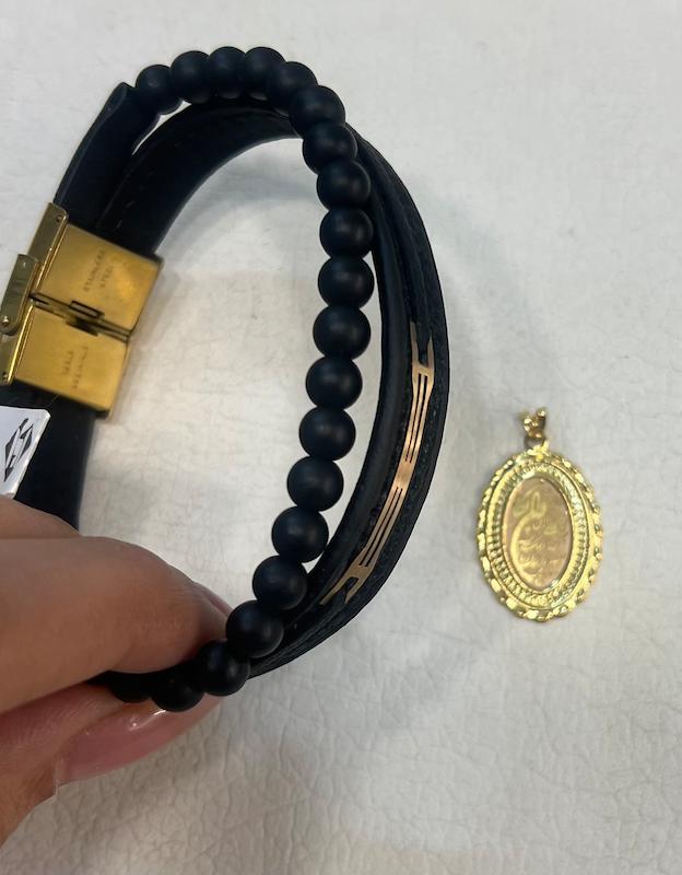 طلای گرمی طلا ۱۸ عیار دستبند چرم و پلاک ان یکاد گالری بابل طلا