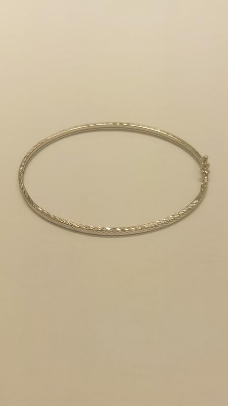 بنگل زنانه طلا ۱۸ عیار بنگل ژورنالی تراش گالری طلای دانژه