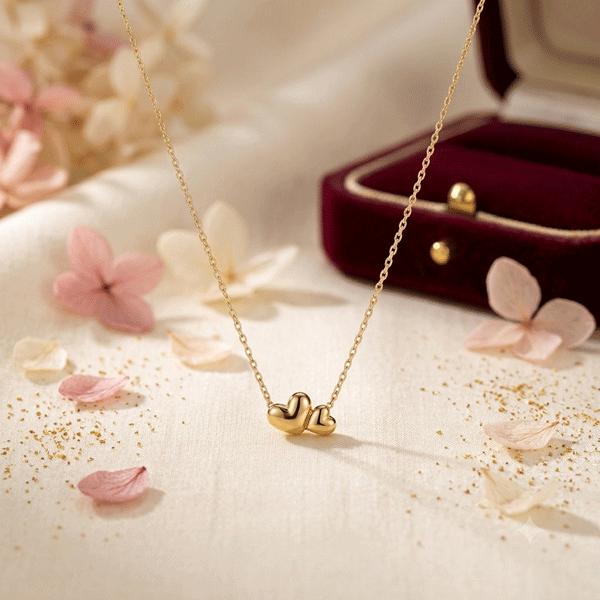 گردنبند زنانه طلا ۱۸ عیار گردنبند طلا طرح دو قلب گالری طلای روژمان