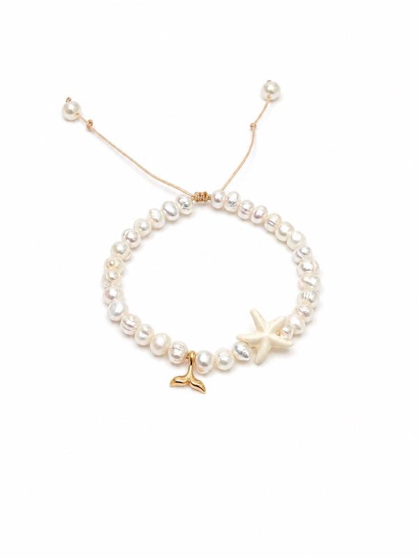 دستبند زنانه طلا ۱۸ عیار دم وال با مروارید پرورشی گالری طلا سرور گلد