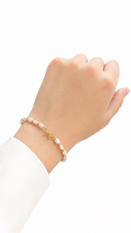دستبند زنانه طلا ۱۸ عیار پاپیون (بند مروارید و استیل) VoGa GOLD