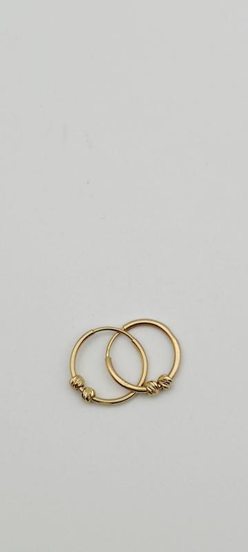 گوشواره زنانه طلا ۱۸ عیار گوشواره حلقه ای دوریکا طلای همتا