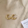 گوشواره حلقه‌ای سه‌لایه درهم تنیده (Triple Hoop) - سبک مینیمال و ترند