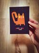 کارت پستال تبریک سال نو با طرح گربه فانتزی در دست