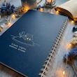 دفتر یادداشت خط دار با طرح کلبه ای روی دریاچه در شب