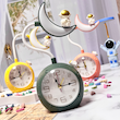 عکس از رنگ سبز چراغ مطالعه و ساعت رومیزی طرح ماه