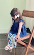 ست تاپ دکلته سرمه‌ای موسلین و شلوارک طرح گیاهی دخترانه مدل آیلا