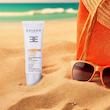 کرم ضد آفتاب رنگی صورت اریکه spf50 مدل Light Beige مناسب برای انواع پوست نرمال تا خشک حجم 50 میلی‌لیتر