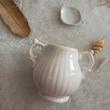 گلدان دکوری، ابعاد 18×13×14 سانتی‌متر، جنس سرامیک، وزن 550 گرم