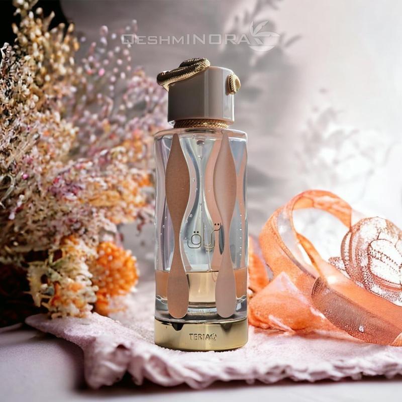 عطر ادوپرفیوم لطافه مدل تریاق رایحه شیرین و گرم